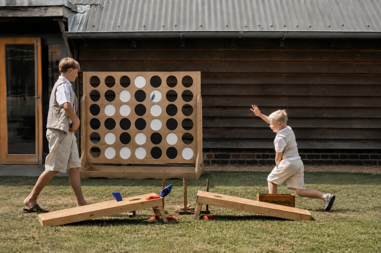 Lawn games in full swing at a wedding